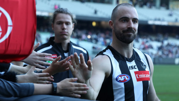 Man of Steele: Mercurial Magpie celebrates with fans after the round 9 win over the Saints.