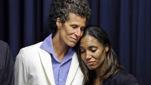 Victim Andrea Constand, left, embraces prosecutor Kristen Feden after the verdict in April.