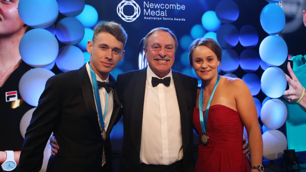 John Newcombe with reigning Newcombe medallists Ashleigh Barty and Alex de Minaur. 