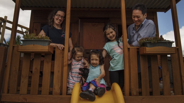 Nicole, Maddy, Briella, Lana and Bernard Luk at their Glenhaven home before the girls' surgery.