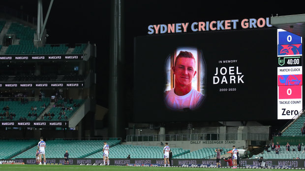 Players stand for a minute's silence in memory of Boyd Cordner's cousin Joel Dark before kick-off at the Sydney Cricket Ground.