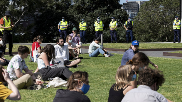 Students sitting down in the park were allowed to stay. Those protesting were fined. 