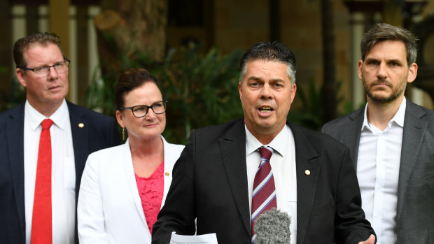 (From left) the Queensland Government Health Committee's Barry O'Rourke, Joan Pease, Aaron Harper, and Michael Berkman at a press conference at Parliament House in Brisbane last year. 