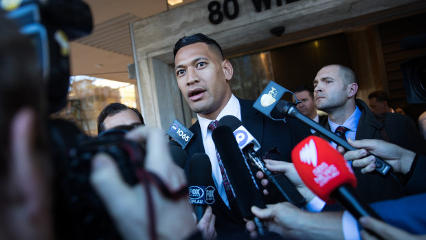 Israel Folau addresses media at the Fair Work Commission in June.