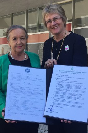 ACT Speaker Joy Burch and Northern Territory Speaker Kezia Purick with their petitions to Senate president Scott Ryan.