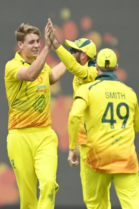 Cameron Green celebrates after taking the wicket of Sikandar Raza, one of five he collected.