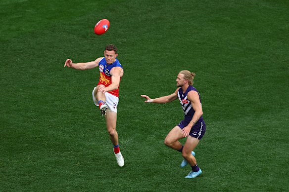Brisbane’s Ryan Lester kicks his side into attack.