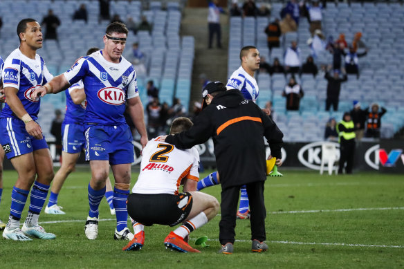 Paul Momirovski is consolled by a ballboy after missing a last-minute kick.