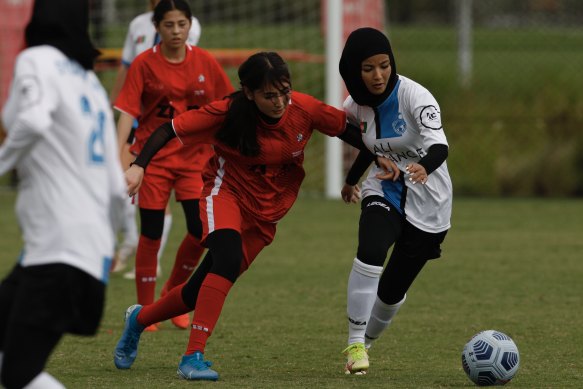 Action between Melbourne and Sydney at the Wanderers Football Stadium.