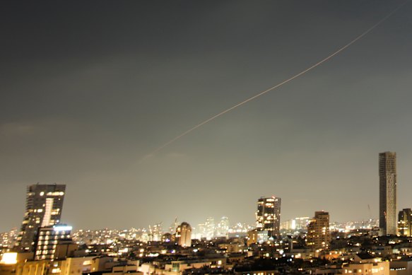 A missile flies in the air over central Israel during an Iranian missile attack on Sunday.