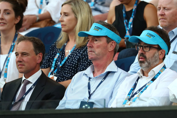 Greg Hunt with ex-footballer Neale Daniher (centre) and the then Victorian sport minister, Martin Pakula, at the Australian Open in 2019.