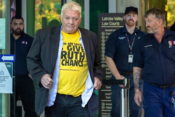 The protester after he was removed from court on Monday.