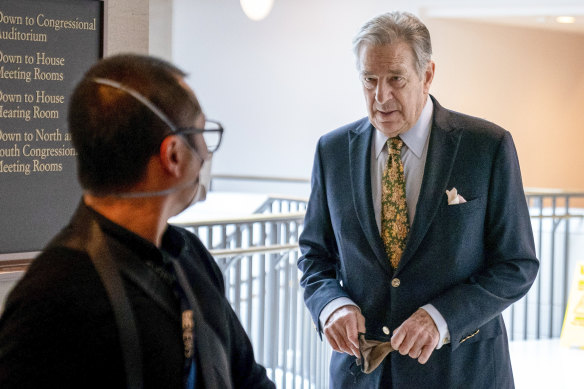 Paul Pelosi, right, the husband of US House Speaker Nancy Pelosi in March.