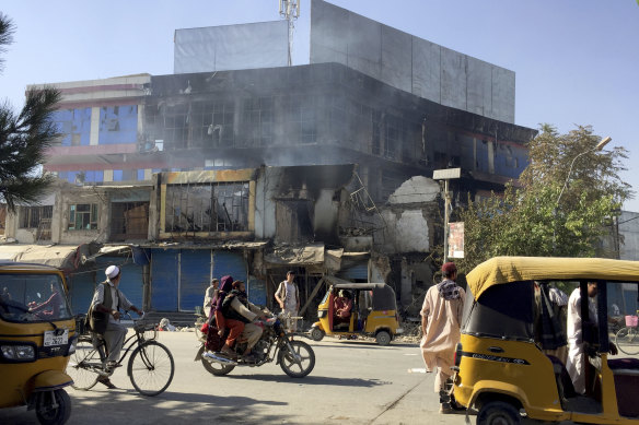 Shops are damaged shops after fighting between Taliban and Afghan security forces in Kunduz city, northern Afghanistan on Sunday.