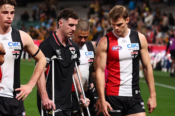 Sam Flanders of the Saints is seen with crutches.