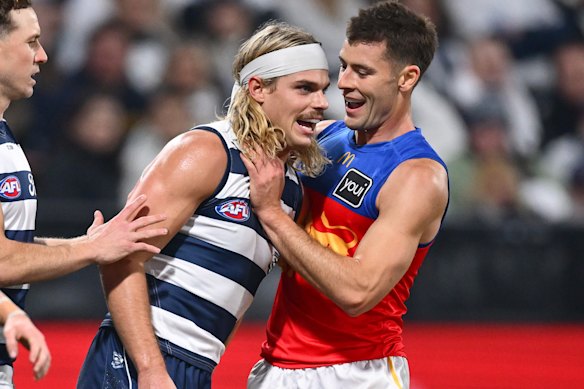 Josh Dunkley remonstrates with former Western Bulldogs teammate Bailey Smith.