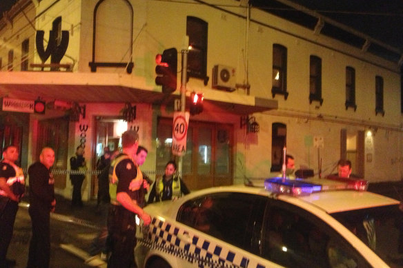 Police outside Woodstock Pizzicheria in Brunswick East after shots were fired into the building in 2013.