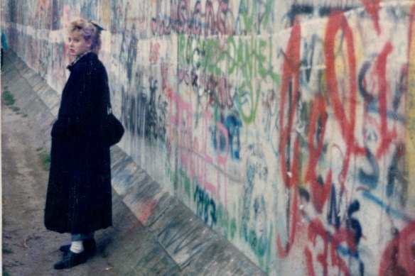 Anna Funder beside the Berlin Wall in 1988, the year before it came down.