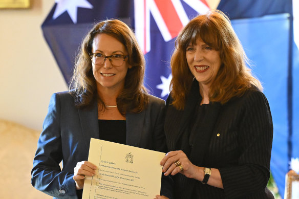 Jaclyn Symes (left) was sworn in as the state’s first female treasurer by Victorian Governor Margaret Gardner.