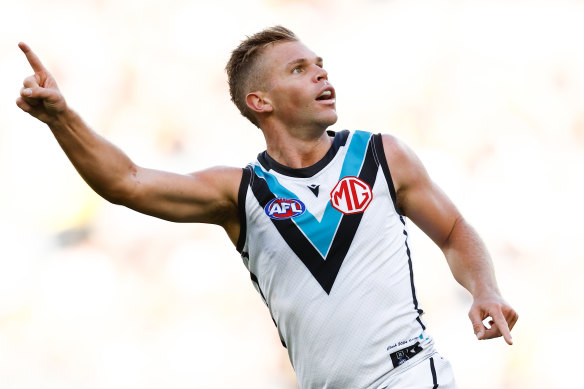 Dan Houston is staying at Port Adelaide.