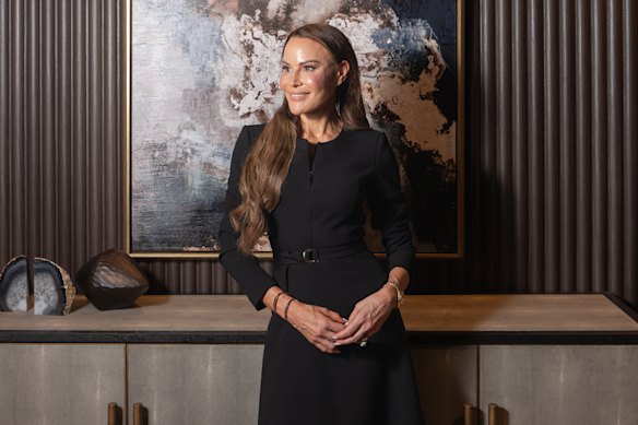 Designer Karen Gee wearing a dress from her ready-to-wear collection at her Sydney home in 2024.