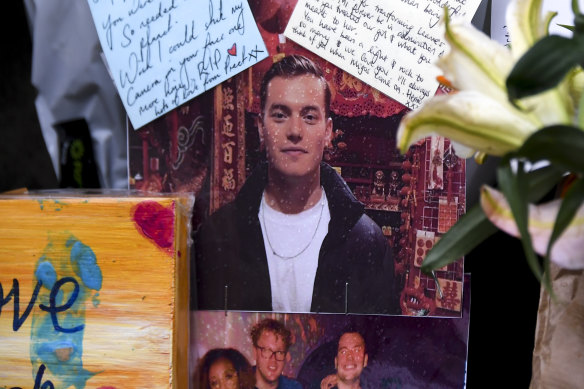 Flowers and tributes left at London Bridge to remember Jack Merritt. 