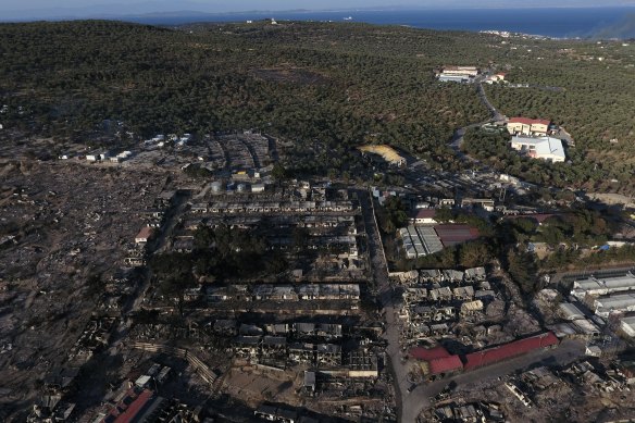 The burnt Moria refugee camp is seen from above. A third fire burnt what was left from the camp on Thursday.