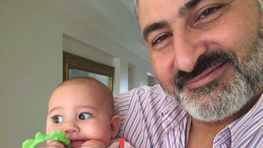 Hazem Hamouda,with his granddaughter, Aveline. 