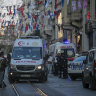 Security and ambulances at the scene of the explosion.