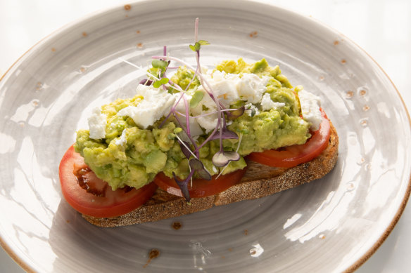Smashed avocado, tomato and goat’s cheese on toast.