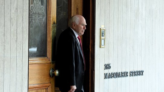 Former Prime Minister John Howard leaves the men’s only Australian Club after holding a vote to determine if women can become members.