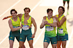 From left: Rohan Browning, Josh Azzopardi, Lachlan Kennedy and Calab Law after winning gold in the men’s 4x100m relay.
