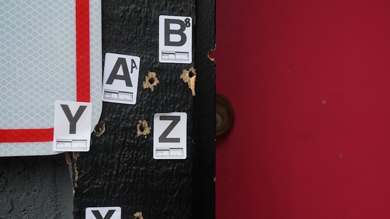 Partygoers had gathered to cut the cake. Then came a popping sound