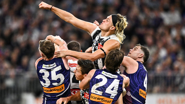 Magpies count injury cost after Freo draw as Cox, Mihocek and Pendlebury face scans