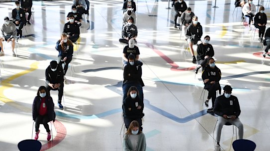 Year 12 students begin to get their Pfizer vaccinations at the hub at Homebush