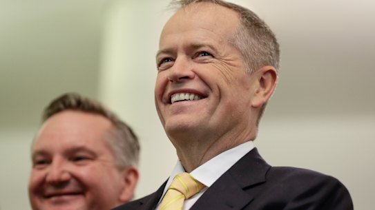 Shadow Treasurer Chris Bowen and Opposition Leader Bill Shorten during speech on Labor's Women's Budget Statement in the caucus room at Parliament House.