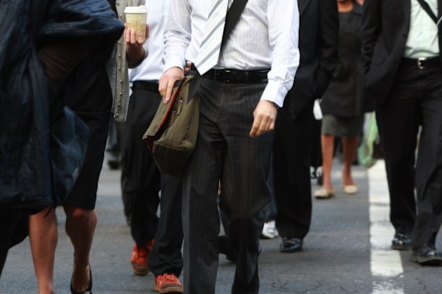 Generic business people crossing the road.