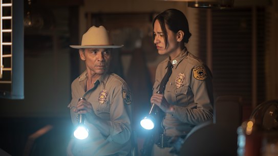 Zahn McClarnon as Joe Leaphorn and Jessica Matten as Bernadette Manuelito in Dark Winds.
