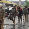 Ukrainian servicemen as they leave the besieged Azovstal steel plant in Mariupol in eastern Ukraine.