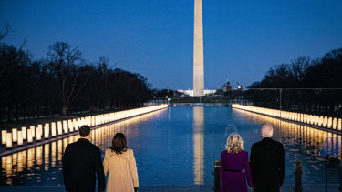 U.S. President-elect Joe Biden, from right, wife Jill Biden, U.S. Vice President-elect Kamala Harris and husband Douglas Emhoff stand at the Lincoln Memorial Reflecting Pool on Inauguration eve. 