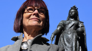 Professor Jenny Hocking, with a statue of Queen Victoria behind her, is taking her fight to release correspondence between Queen Elizabeth and former governor-general Sir John Kerr over the dismissal to the High Court. 