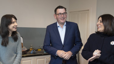 Tenant Elizabeth Watt, Victorian Premier Daniel Andrews and Consumer Affairs Minister Marlene Kairouz hold a press conference on rental reforms in Ms Watts' home. 