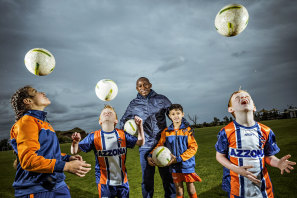Former Brazilian soccer star Mineiro is now coaching kids such as Wesal, 10, Ciaran, 9, Shiven, 7, and Ruairi, 7, in Aintree, in Melbourne’s north-west.