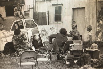 Outside painter John Bell’s studio at Dunmoochin, Victoria, 1969. Louise is on the car; Tim, at far right, stands behind John Olsen.