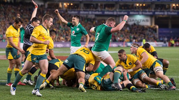 Luck of the Irish: The visitors celebrate their only try of the match in a tight Test.