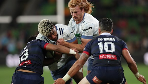 Hoskins Sotutu rumbles forward for the Blues against the Rebels.