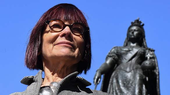 Professor Jenny Hocking, with a statue of Queen Victoria behind her, is taking her fight to release correspondence between Queen Elizabeth and former governor-general Sir John Kerr over the Dismissal to the High Court. 
