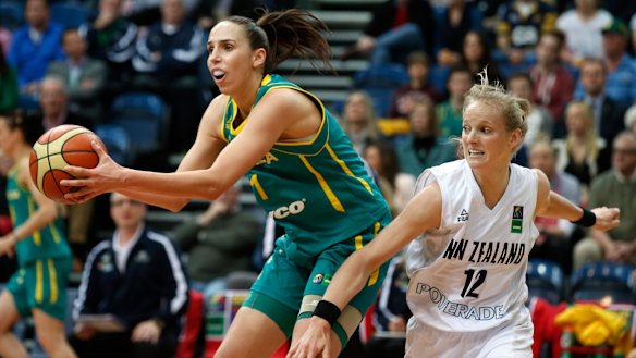 Laura Hodges (left) representing the Opals.