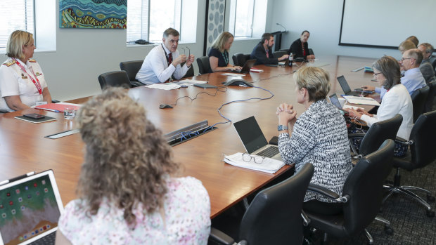 Then-Chief Medical Officer Professor Brendan Murphy chairing a meeting with state and territory Chief Health Officers on March 16, when Australia was still figuring out the virus.