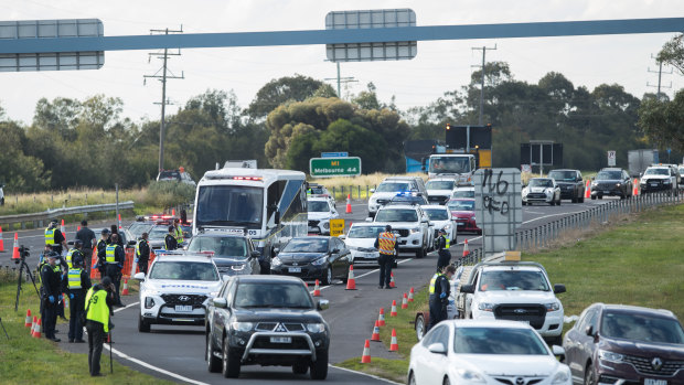 Motorists at a checkpoint streaming towards Geelong on Thursday. 